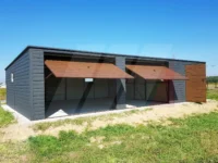 Garáž z trapézového plechu grafit 10m x 6m výklopné brány ořech