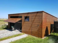 Garáž z trapézového plechu 6m x 6m s výklopnou bránou a dveřmi