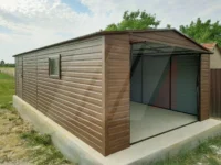 Plechová garáž se sedlovou střechou 4m x 7m výklopná brána