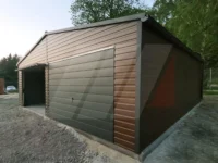 Dvojgaráž z plechu ořechová 7m x 6m výklopné brány